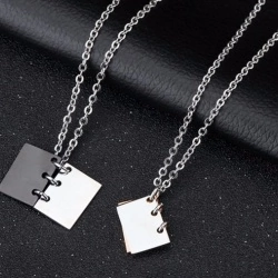 Парний кулон для закоханий зі сталі.