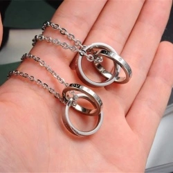 Парний кулон для закоханий із сталі Кільця Романтика