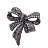 Брошка бантик з марказитами