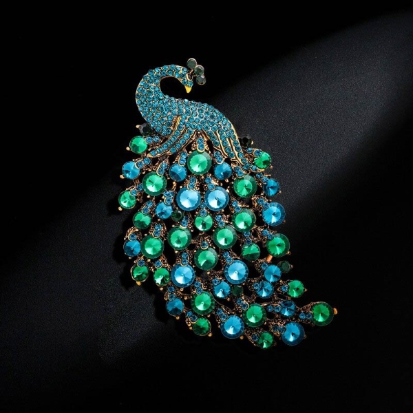 Брошка Павич кристал