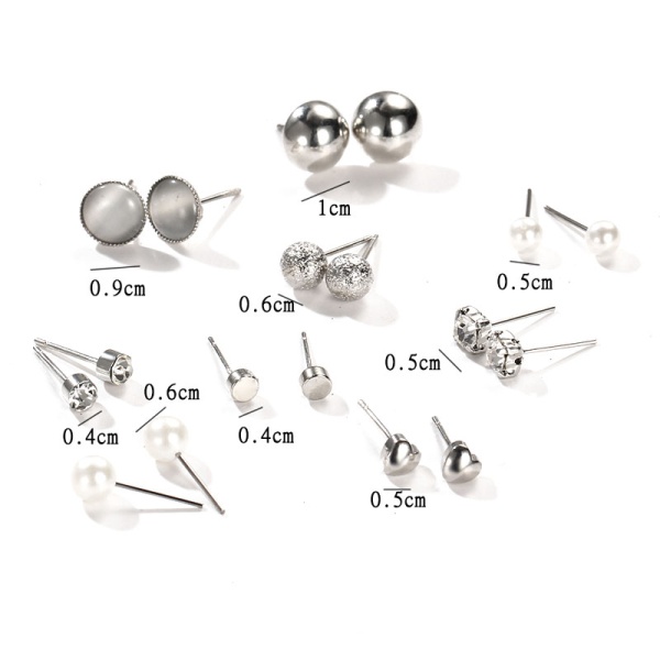 Серьги гвоздики Ассорти серебристого цвета (набор из 9 штук)