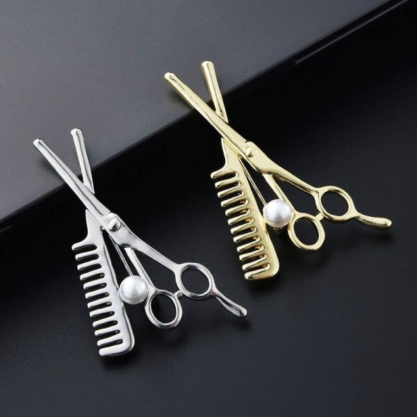 Брошка перукар