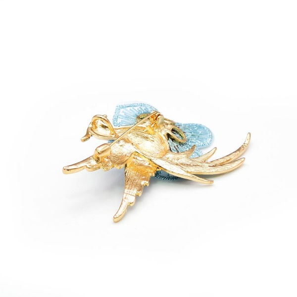 Брошь Феникс на цветке